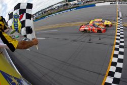 Kevin Harvick beats Jamie McMurray to the finish line by .011 seconds, the eighth-closest margin since the advent of electronic scoring in 1993, to win the Aaron's 499 at Talladega Superspeedway. Photo credit Todd Warshaw/Getty Images
